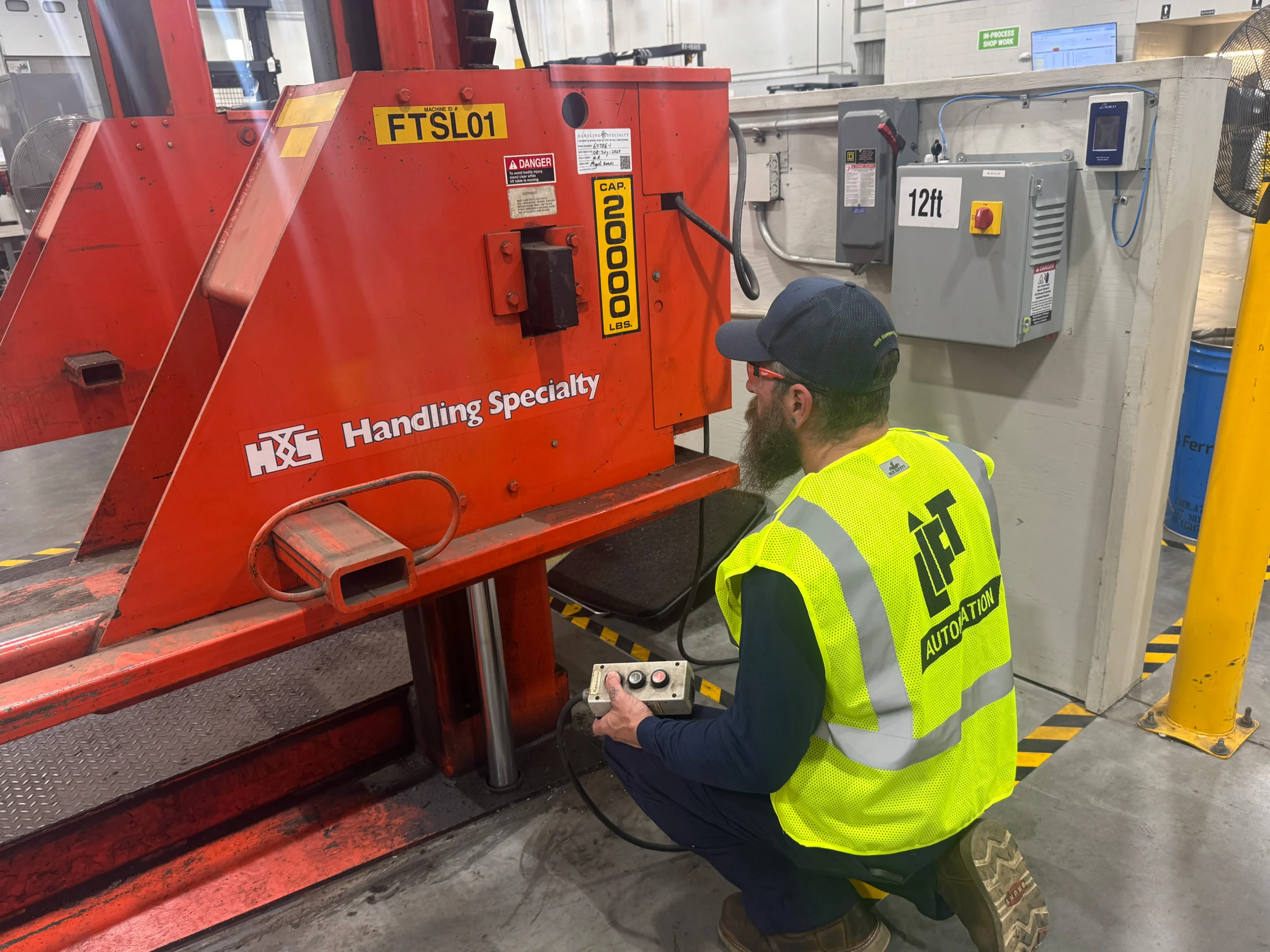 Lift, Inc. Technician Performing Lift Inspection